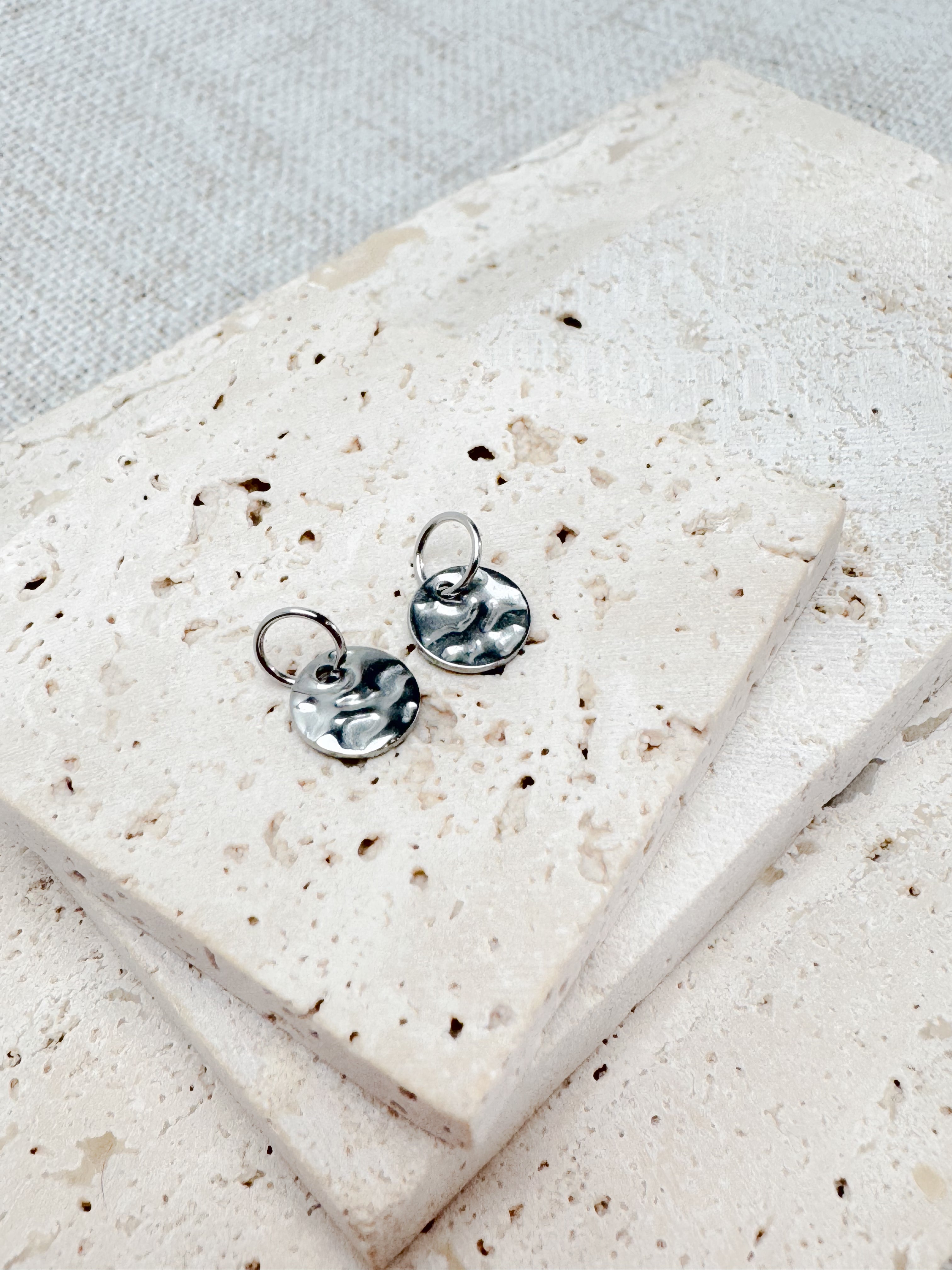 Silberne Charms