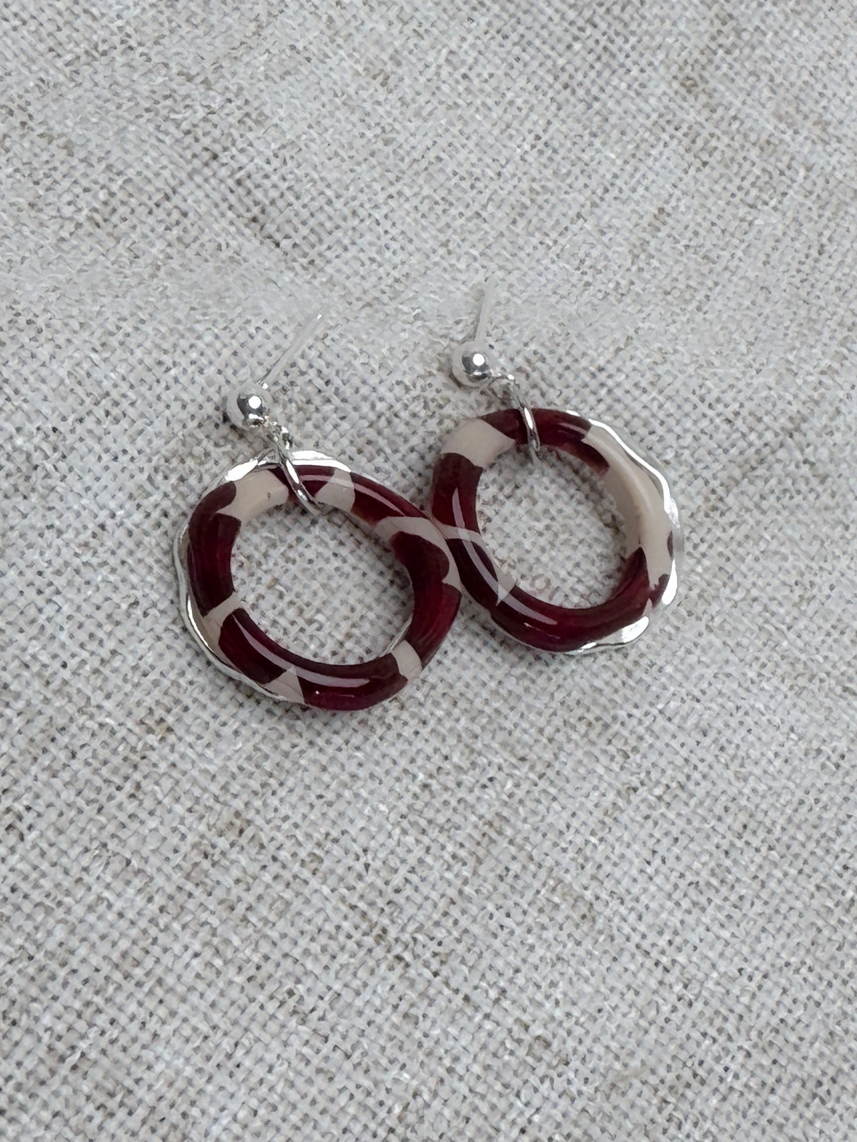 Burgundy Leo Silver